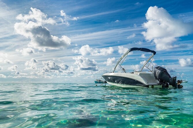 Private speed boat to Ile aux Cerfs full-day Incl: Lunch & Transfer - A barbecue lunch with Mauritian entertainment