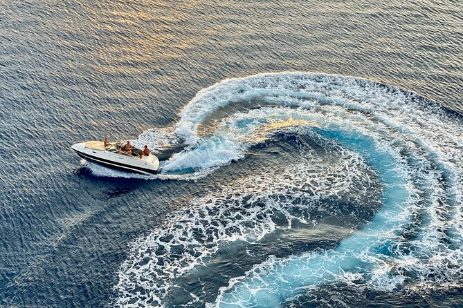 Private speed boat to Ile aux Cerfs full-day Incl: Lunch & Transfer - Racing past Grand River South East Waterfall