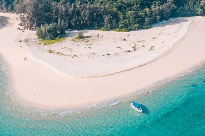 Private Speedboat Tour to Phi Phi Islands From Krabi - Pileh Lagoon, where the cliffs do the work