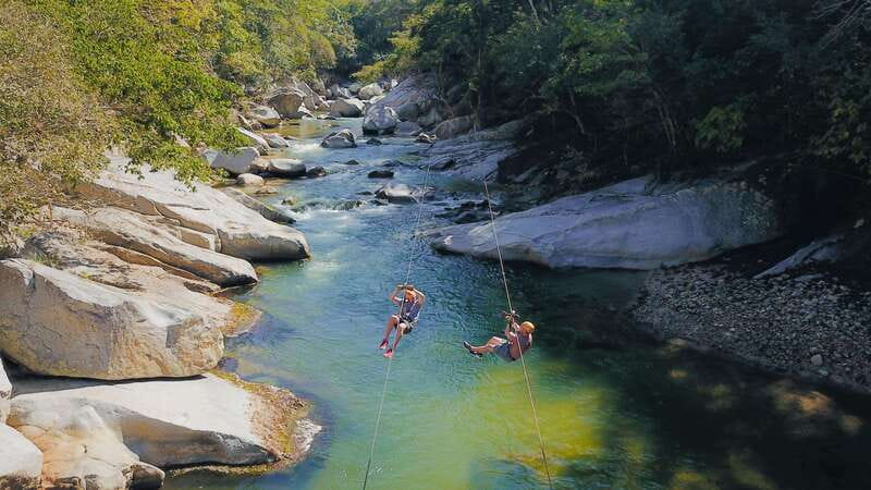 Puerto Vallarta: Canopy Tour with Zipline and Speedboat Ride - River pools, slides, and a welcome change of pace