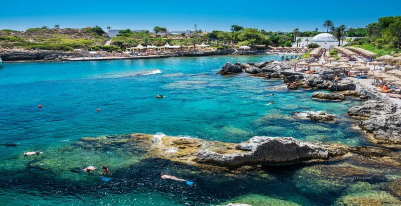 Rhodes: RIB Cruise with Drinks and 4 Swim Stops - Traganou brings rocks, clear water, and caves
