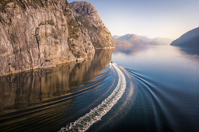 Rib adventure in the Lysefjord with boat house visit - Looking up at Pulpit Rock