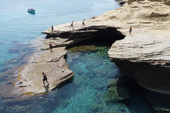 Sea Safari Speedboat Trip in Corfu. Island hopping Sea Tour - Diaplo Island and the sandy cliffs