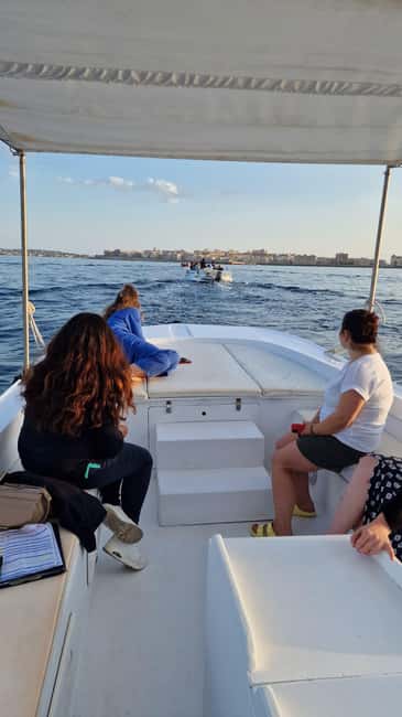 Siracusa: Ortigia & Sea Caves Speedboat Tour with Swim Stop - The caves turn a sightseeing ride into an outing