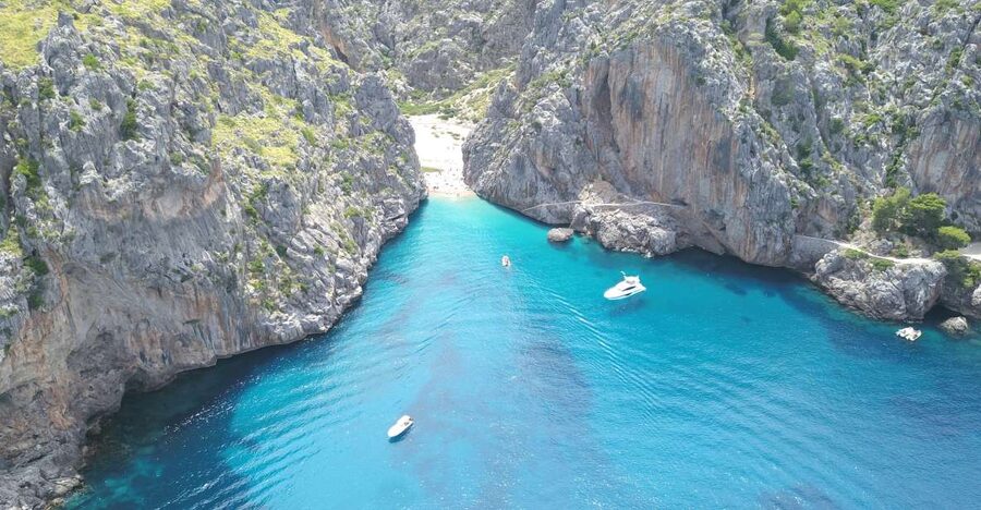 Soller: Sa Calobra & Cala Tuent Speedboat Tour - Passing Cala Tuent beneath the Tramuntana cliffs