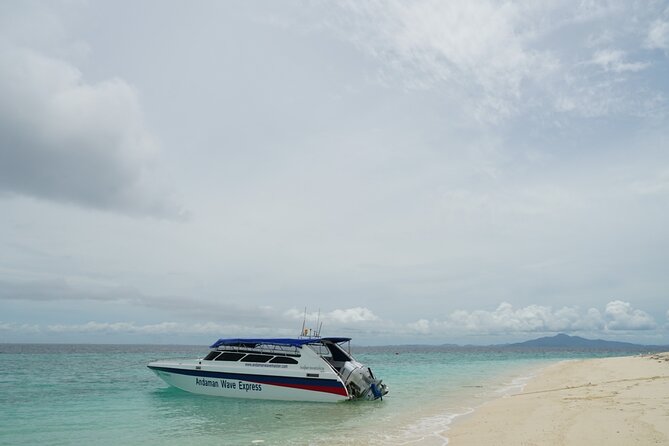 Speedboat Transfer Phi Phi Tonsai to Phuket with Dropoff Service - Life jackets, water, and the small details