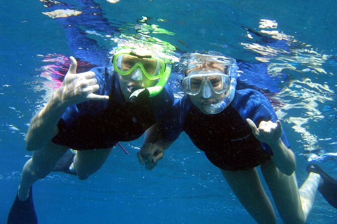 Ultimate Na Pali Coast Zodiac Boat Snorkeling and Sea Cave Tour - Snorkeling with fish, turtles, and clear water