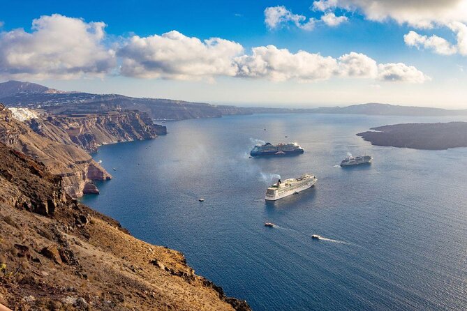 Unique Half-Day Private Motor Boat Cruise in Santorini - Sunset below Oia