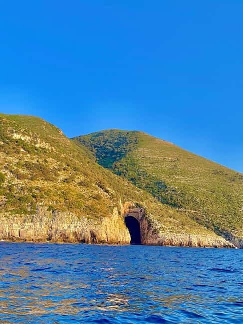 Vlore: Grama Bay & Karaburun Caves 8-Hour Speedboat Tour - Nezhaj Bay: A Quick Photo and Swim Stop