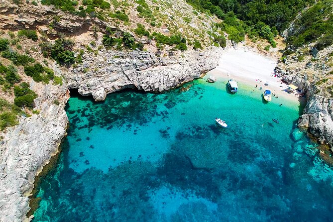 Vlore Private Boat Tour Blue Cave & Grama Bay Adventure - Smuggler’s Canyon and Inglezi Bay keep the route wild